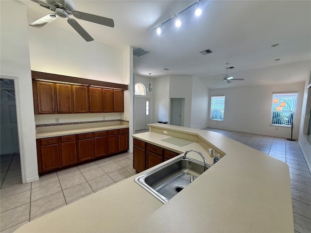 6688 SW 113th Pl, Ocala, FL 34476 - kitchen featuring ceiling fan, a sink, light tile patterned flooring, open floor plan, and light countertops