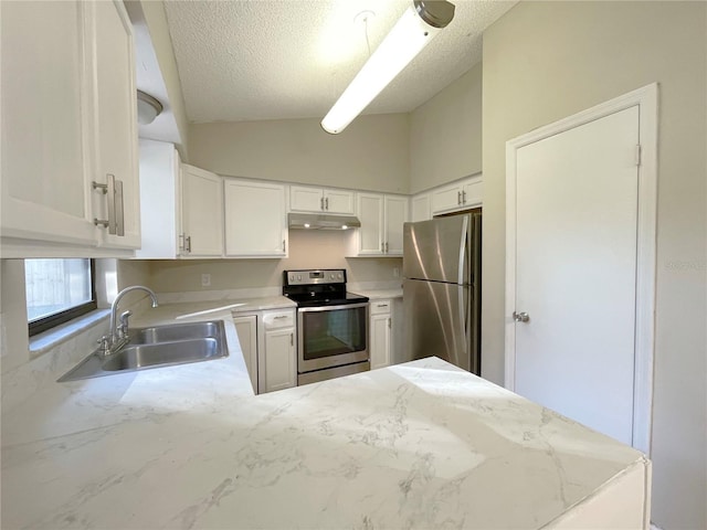 kitchen with white cabinets, sink, stainless steel appliances, and a textured ceiling