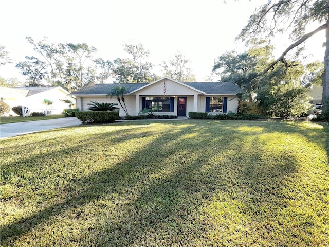 single story home with a front yard