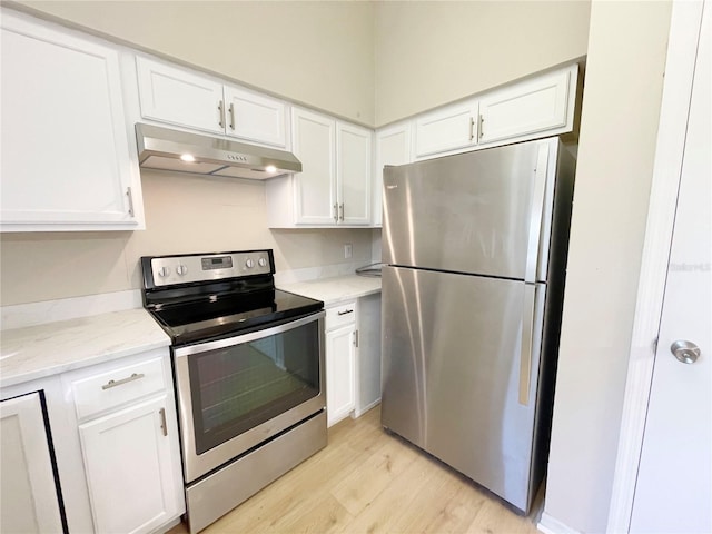 kitchen featuring white cabinetry and stainless steel appliances