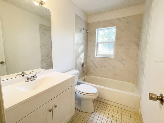 full bathroom with tile patterned floors, vanity, toilet, and tiled shower / bath