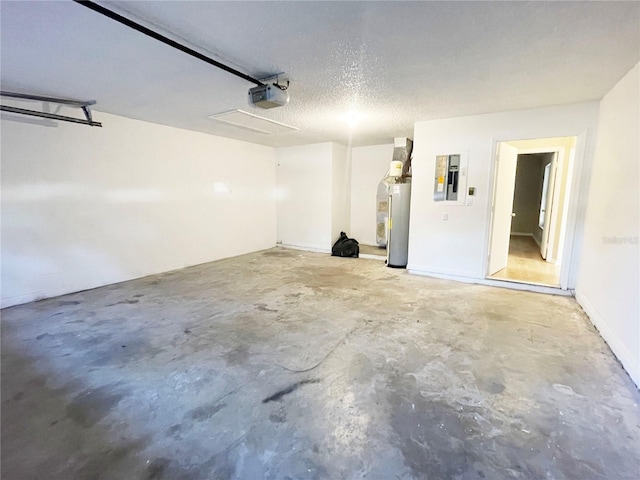 garage featuring electric panel, a garage door opener, and water heater