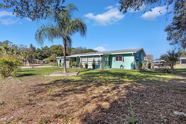 exterior space with a lawn