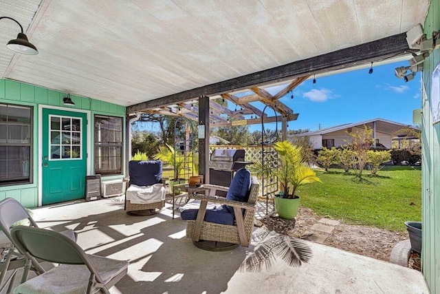 view of patio / terrace featuring a pergola and area for grilling