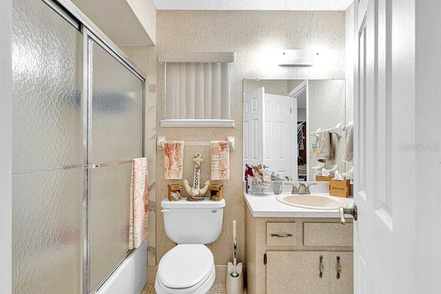 full bathroom featuring vanity, toilet, and enclosed tub / shower combo