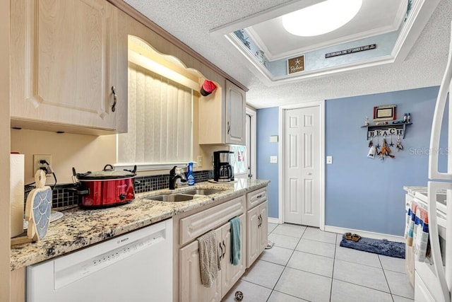 kitchen with sink, crown molding, white dishwasher, a textured ceiling, and light brown cabinetry