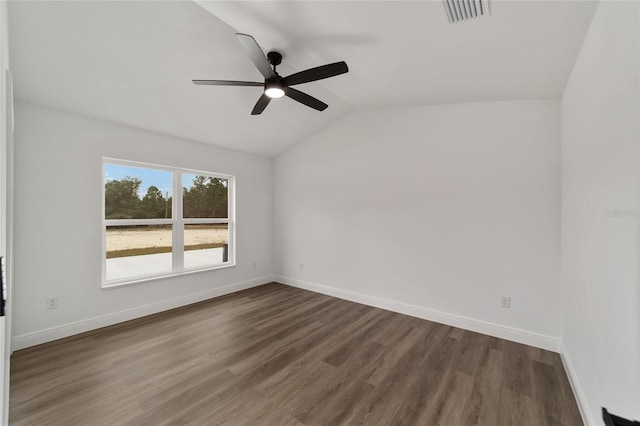 unfurnished room with lofted ceiling, ceiling fan, and dark wood-type flooring