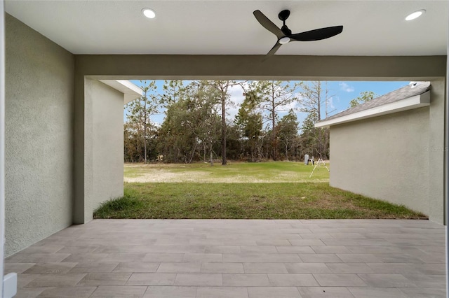 view of patio / terrace featuring ceiling fan