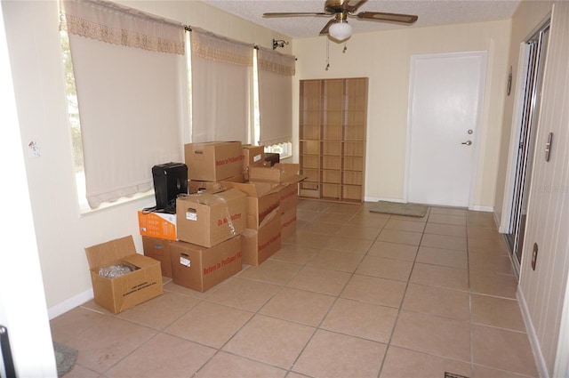 storage room featuring ceiling fan