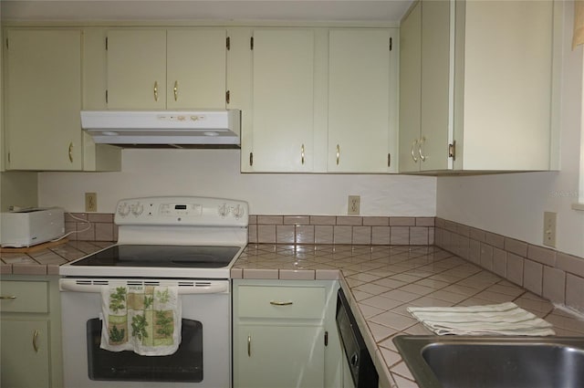 kitchen with tile countertops, white electric range oven, and black dishwasher