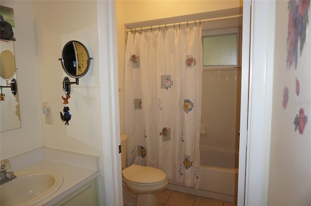 full bathroom featuring tile patterned flooring, vanity, toilet, and shower / tub combo with curtain