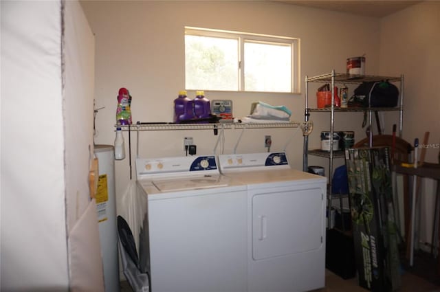 laundry room with separate washer and dryer and gas water heater