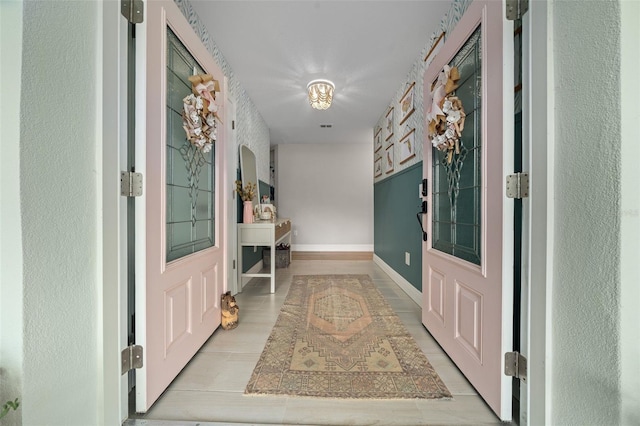 hallway with light hardwood / wood-style flooring