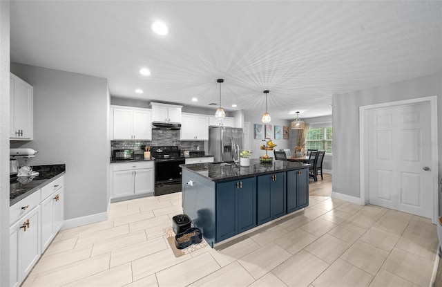 kitchen featuring black range with electric stovetop, white cabinetry, a center island, stainless steel fridge, and pendant lighting