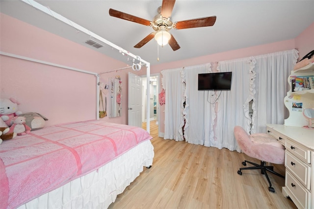 bedroom featuring ceiling fan and light hardwood / wood-style floors