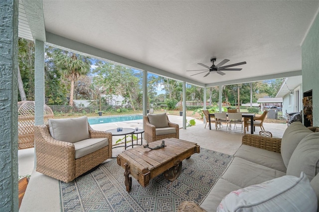 view of patio featuring an outdoor hangout area and ceiling fan