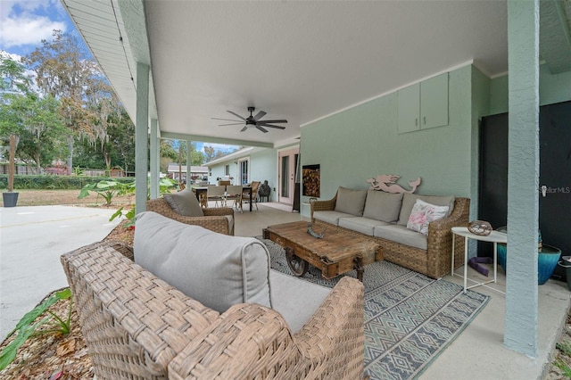 view of patio / terrace featuring an outdoor living space and ceiling fan