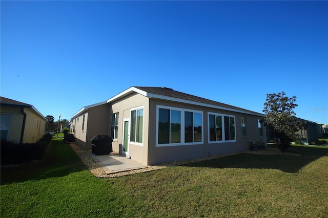 view of property exterior featuring a yard