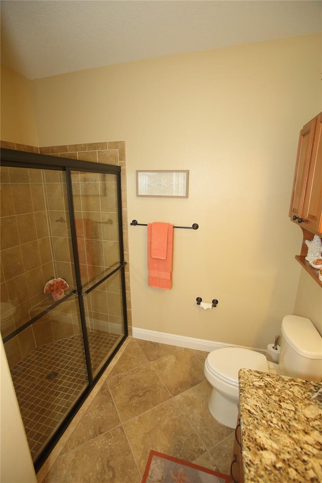 bathroom featuring walk in shower and toilet