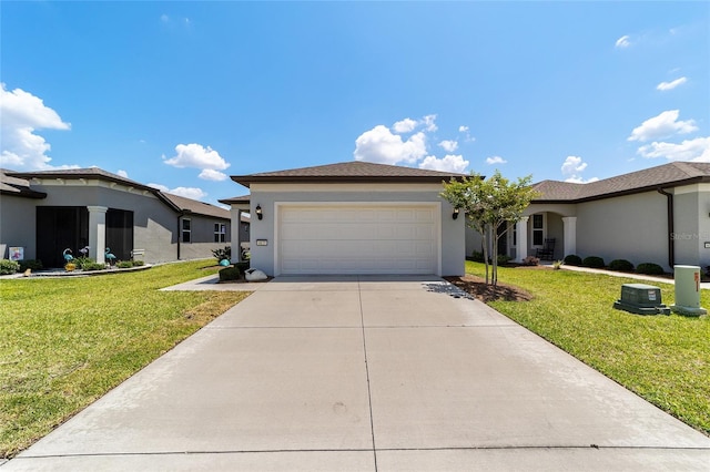 view of front of home with a garage and a front yard