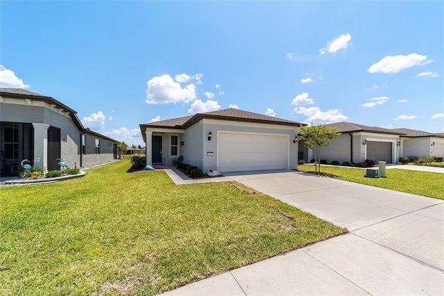 view of front of house featuring a front yard and a garage