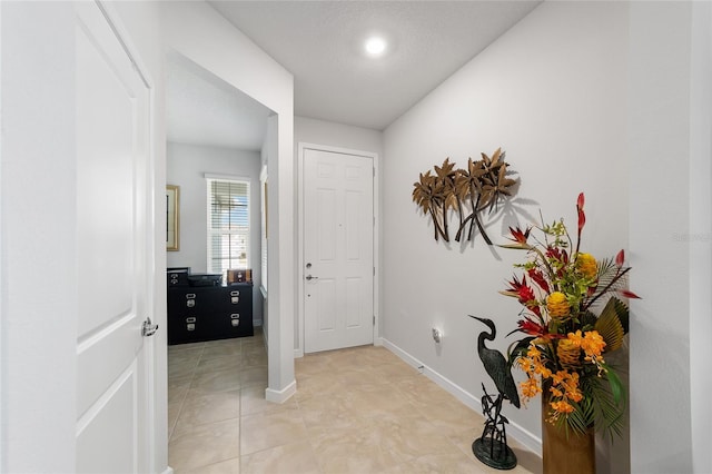 view of tiled foyer entrance