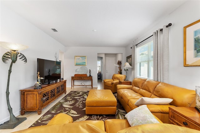 living room with light tile patterned floors