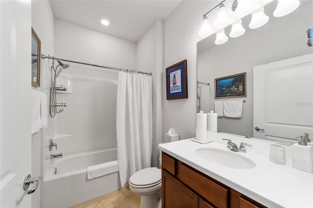 full bathroom featuring shower / tub combo, vanity, toilet, and tile patterned floors