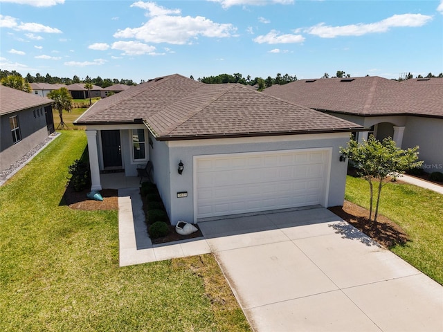 single story home with a garage and a front yard