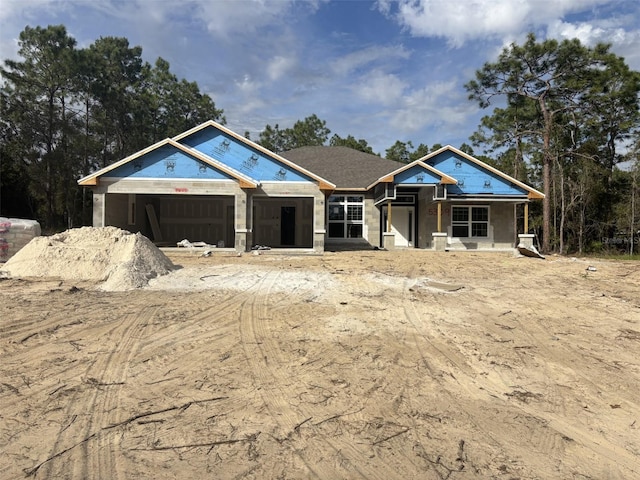 property under construction with a garage