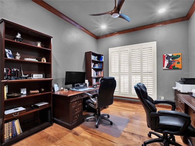 office space featuring light hardwood / wood-style floors, ceiling fan, and ornamental molding