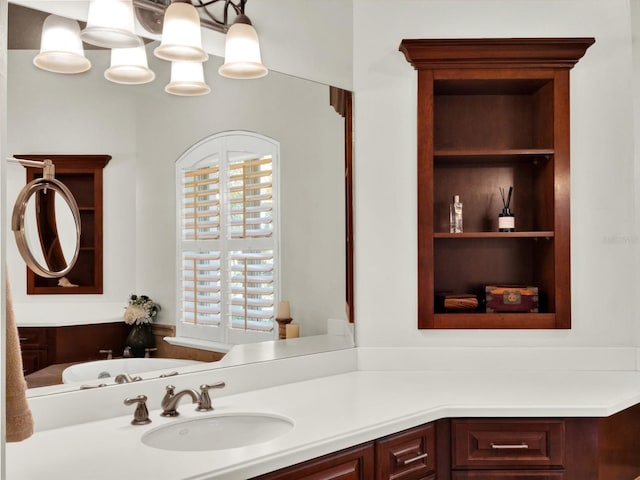 bathroom with vanity and a wealth of natural light