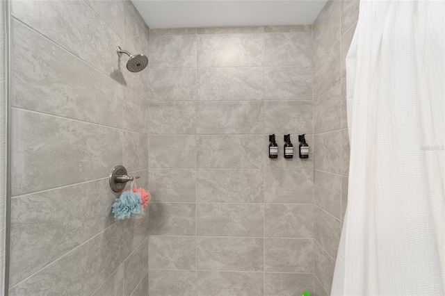 bathroom with a shower with shower curtain