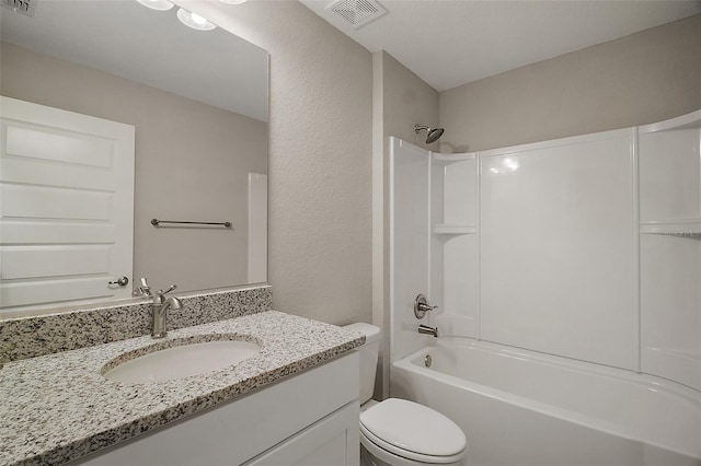 full bathroom with toilet, visible vents, tub / shower combination, and vanity