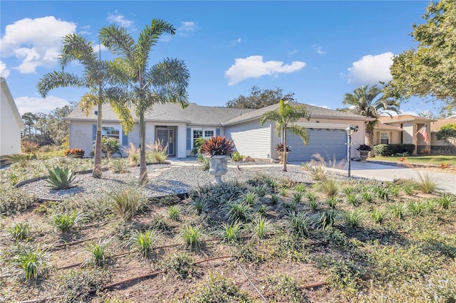 ranch-style home with a garage