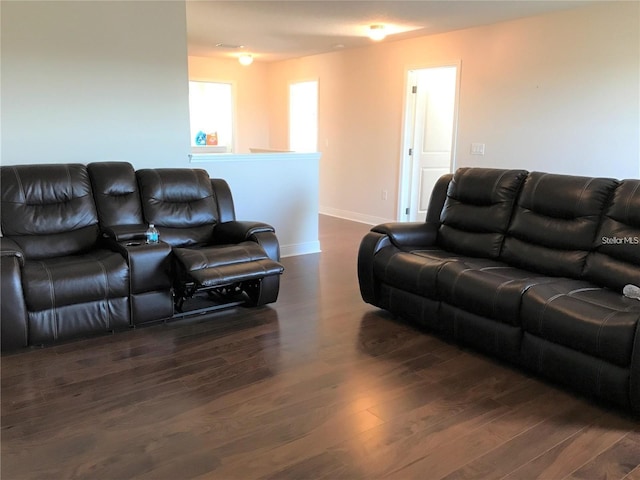 living room with dark hardwood / wood-style floors