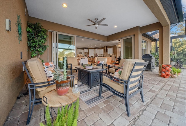 view of patio / terrace with ceiling fan and a grill