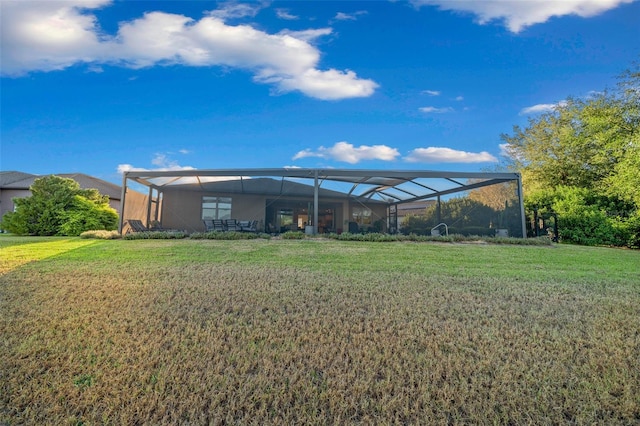 9146 SW 65th Loop, Ocala, FL 34481 - back of property featuring a lawn and a lanai