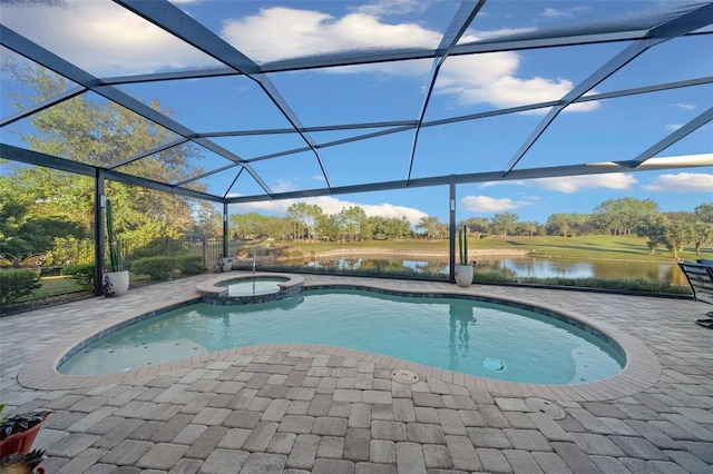 view of swimming pool with glass enclosure, an in ground hot tub, a water view, and a patio