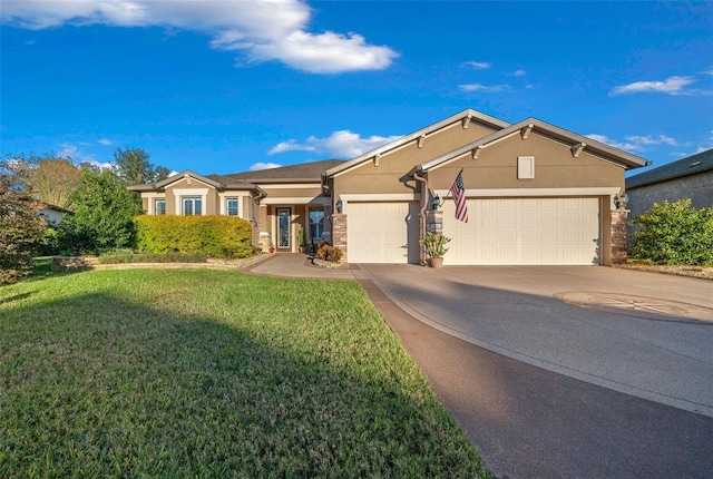 ranch-style home with a garage and a front lawn