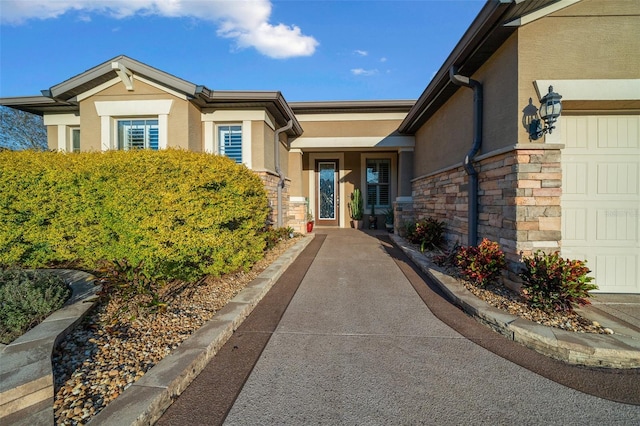 entrance to property featuring a garage