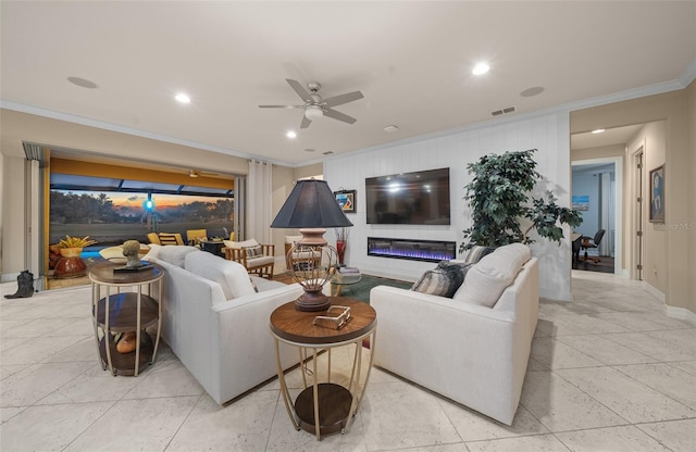 living room with crown molding and ceiling fan