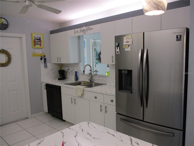 kitchen with white cabinetry, dishwasher, sink, tasteful backsplash, and stainless steel fridge