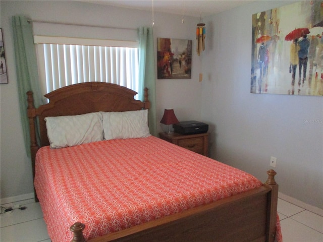 bedroom featuring light tile patterned floors