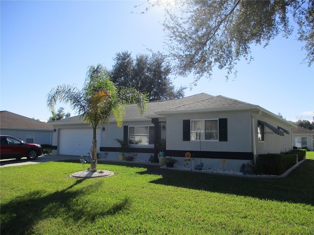 ranch-style home with a front lawn