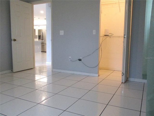 interior space featuring light tile patterned floors