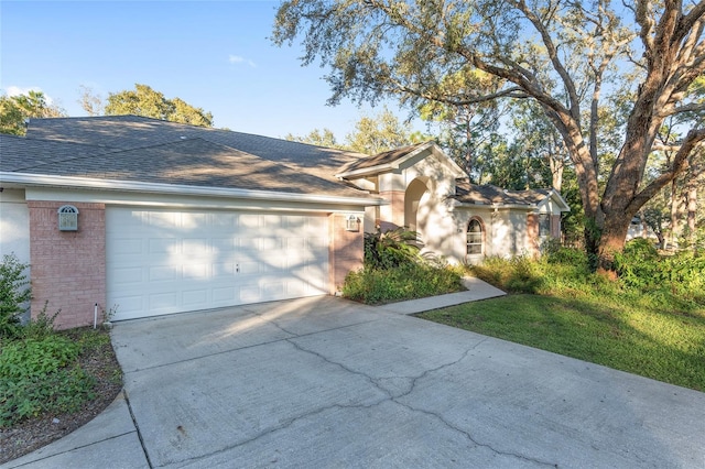 single story home with a garage