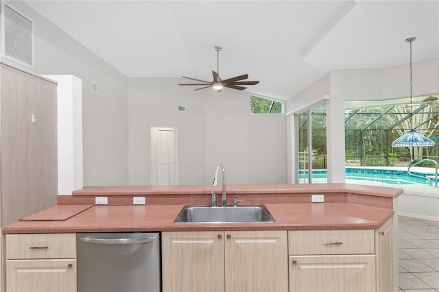 kitchen with light brown cabinetry, stainless steel dishwasher, ceiling fan, and sink