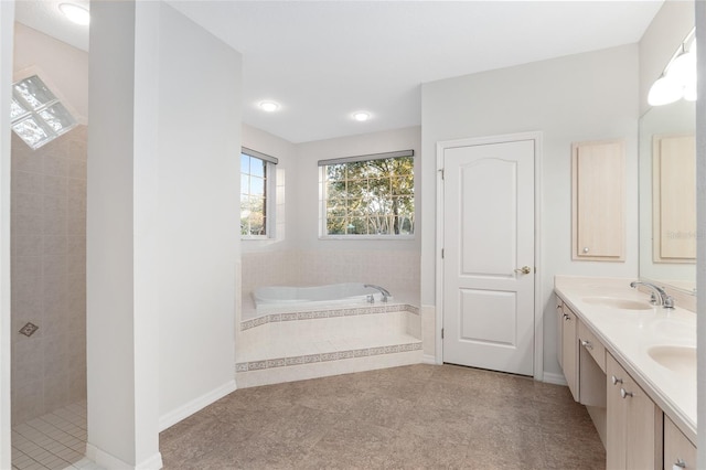 bathroom with separate shower and tub and vanity