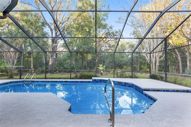 view of pool with a lanai